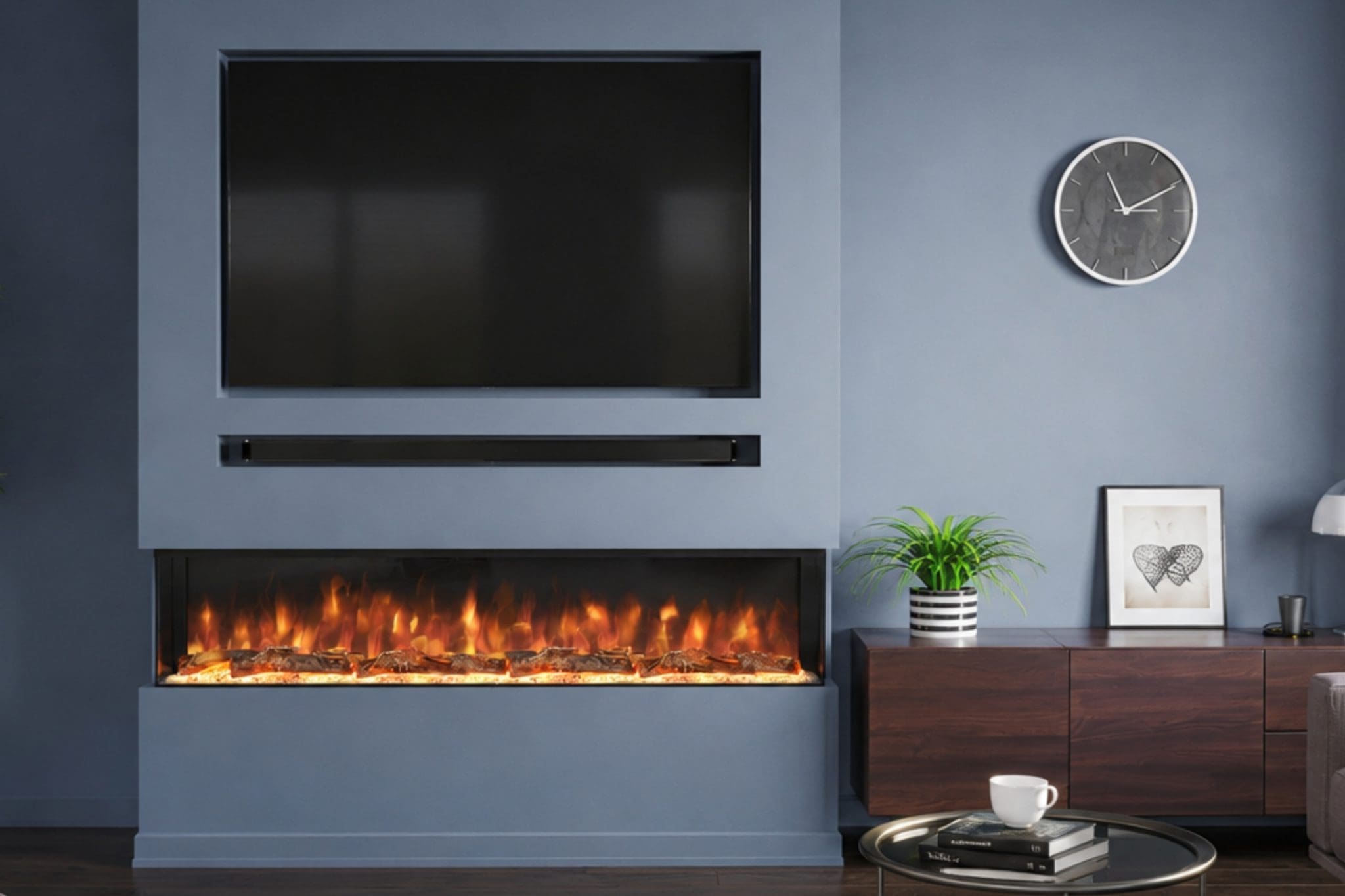 Spectrum Series 60 built-in electric fireplace shown straight-on in a modern blue media wall with TV recess and realistic flame effect from Evolution Fires.