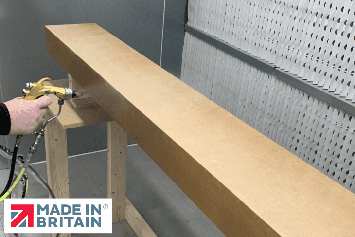 Evolution Fires spray shop in Britain – professional finishing of electric fireplace media walls.